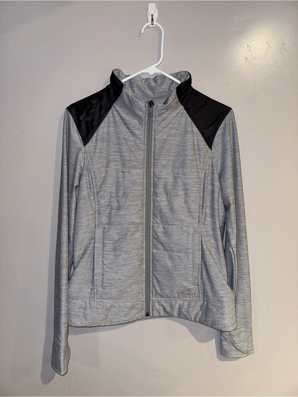 The North Face Light Gray Jacket with Black Shoulder Panels